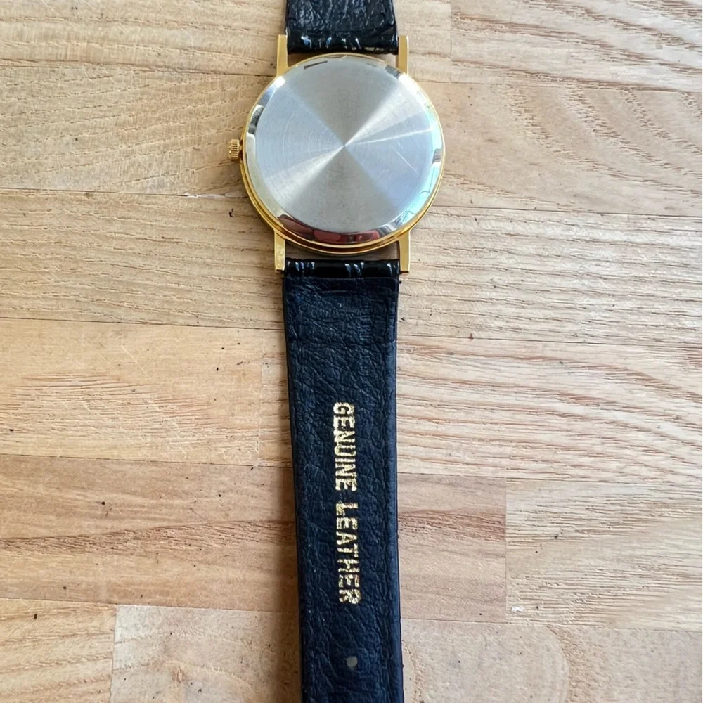 Hawaii Baptist academy black and gold tone watch NEW BATTERY